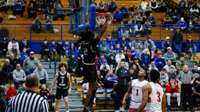 Link Academy's Jasper Johnson throws down a dunk